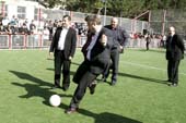 Shida Kartli Governor Zurab Arsoshvili (left), Deputy Head of UNDP Regional Bureau Jens Wandel (centre), and Head of UNDP in Georgia Jaime McGoldrick play soccer at the newly opened playground in Kareli. UNDP/David Khizanishvili