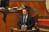 Minister of Education and Science Dmitri Shashkin speaks at the government hour in Parliament last week