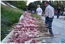 CDM supporters prepare meat.