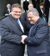 Lithuanian Foreign Minister and Georgian Parliamentary Chairman shake hands