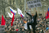 Pro-Russian protesters with Russian flags take part in a rally in central Donetsk March 1, 2014.