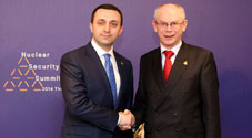 Georgian Prime Minister shakes hands with the President of the European Council